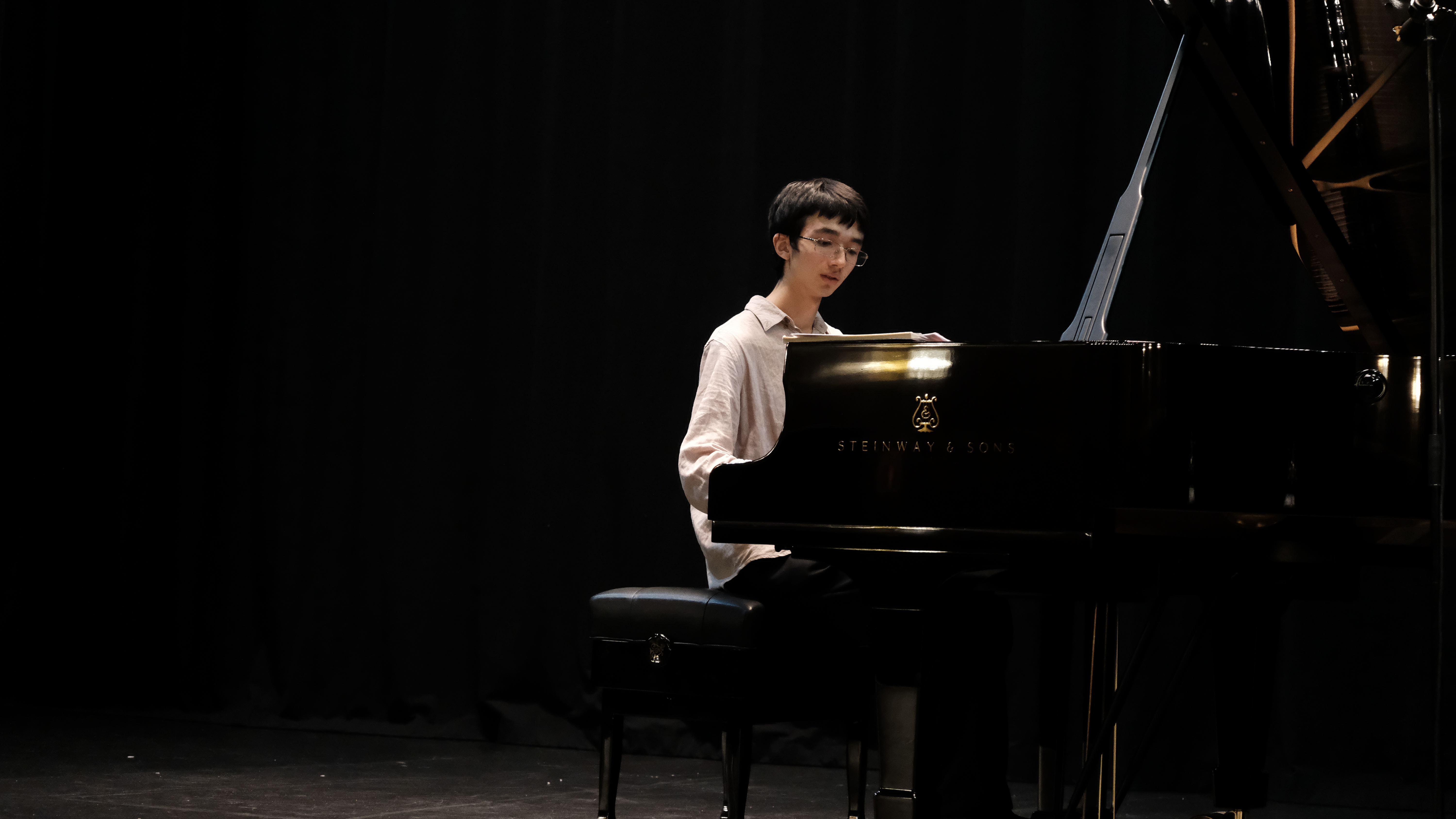 Jack playing a grand piano